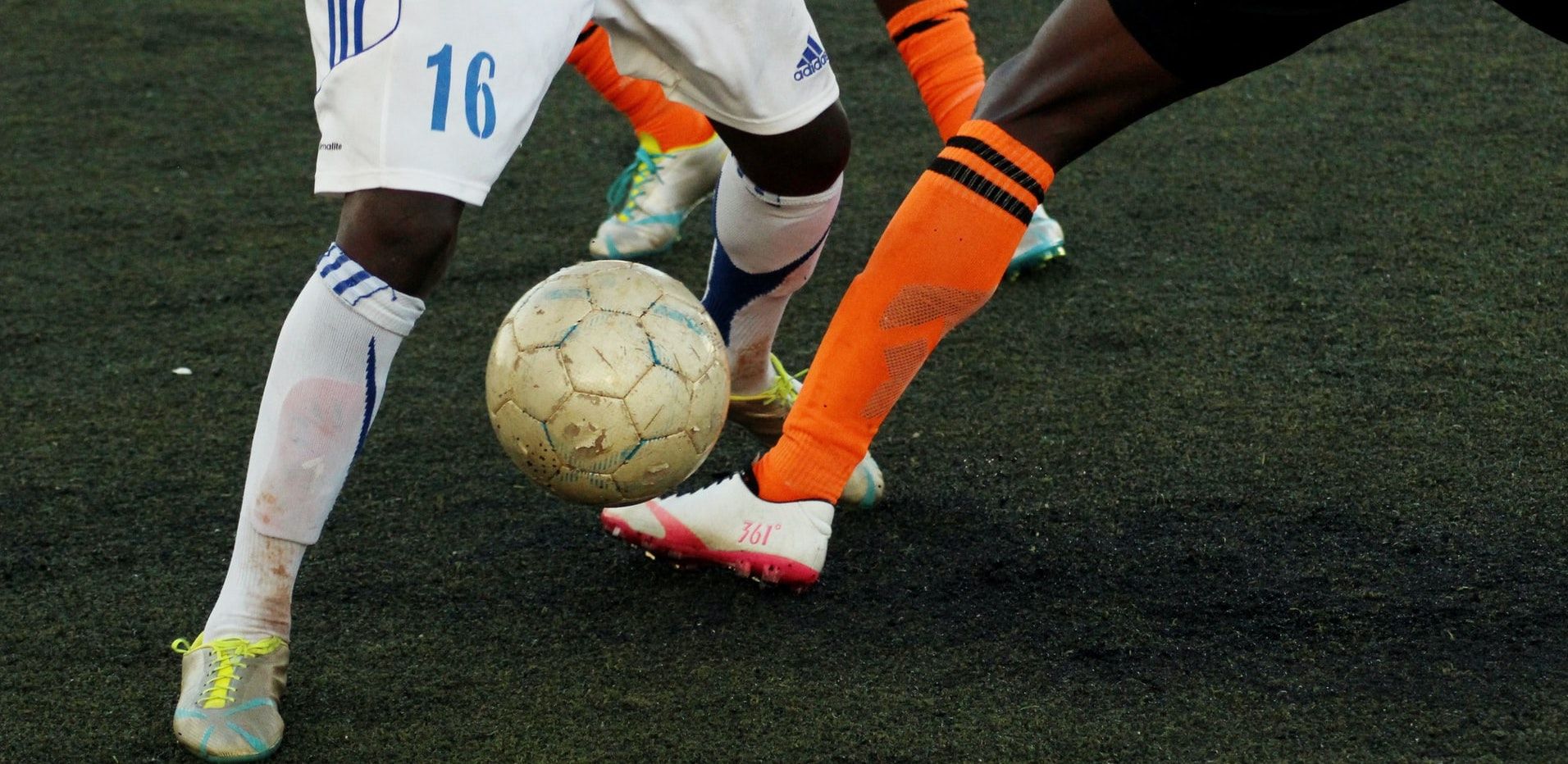 people playing football on the field